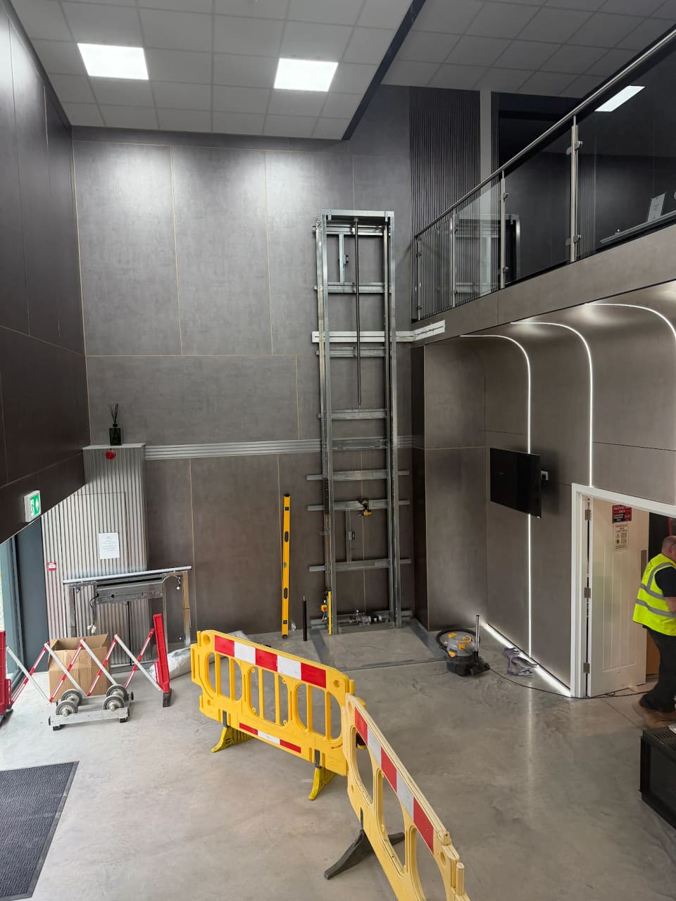 Direct Lift Solutions engineers installing a lift