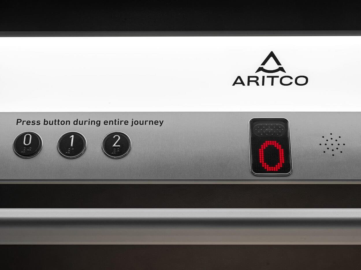 Aritco PublicLift Access control panel with lit handlebar