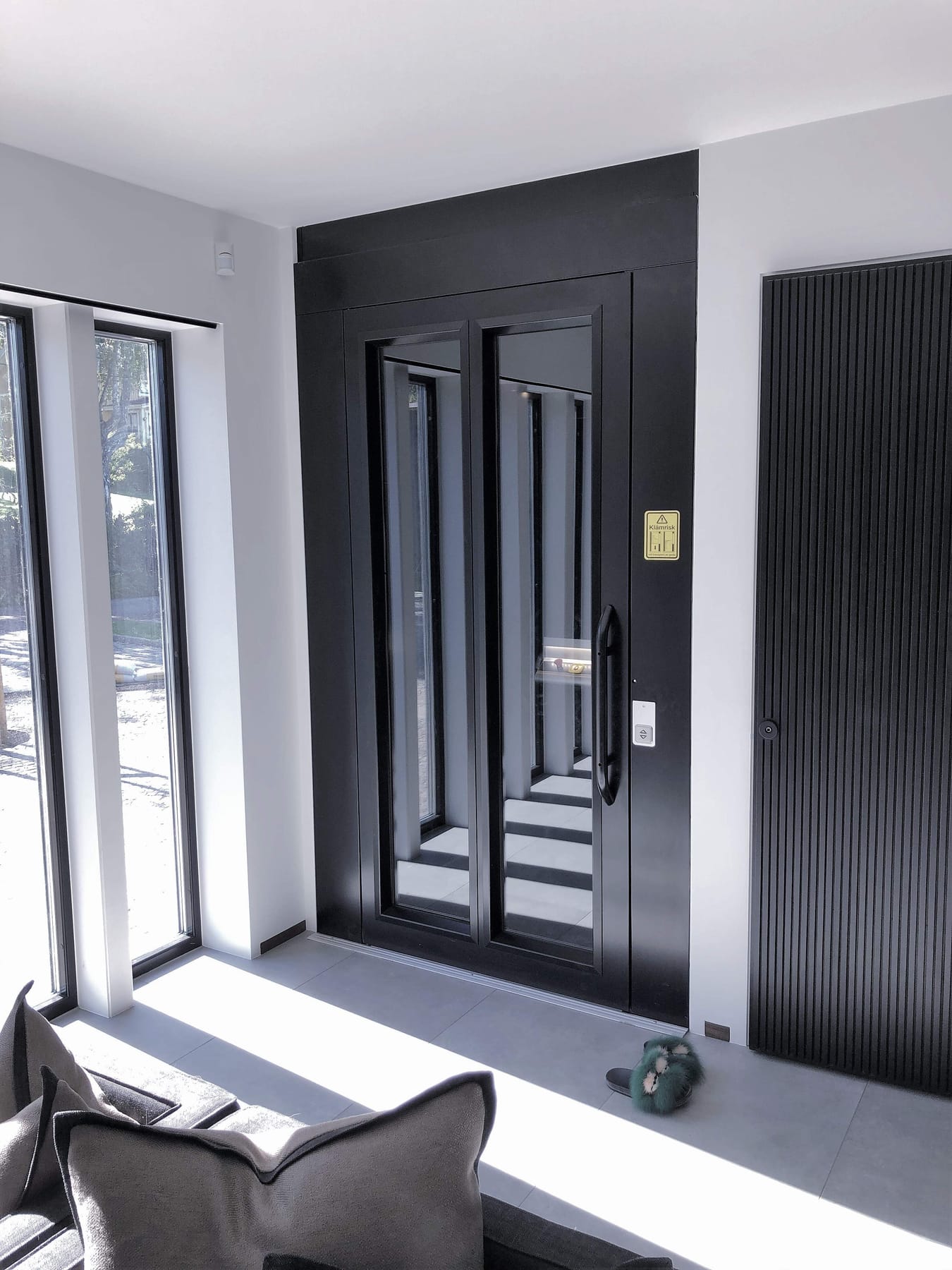 Innovation Lift ILS 05K enclosed platform lift in a modern home